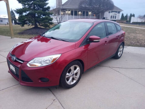 2014 Ford Focus for sale at Heartbeat Used Cars & Trucks in Harrison Township MI
