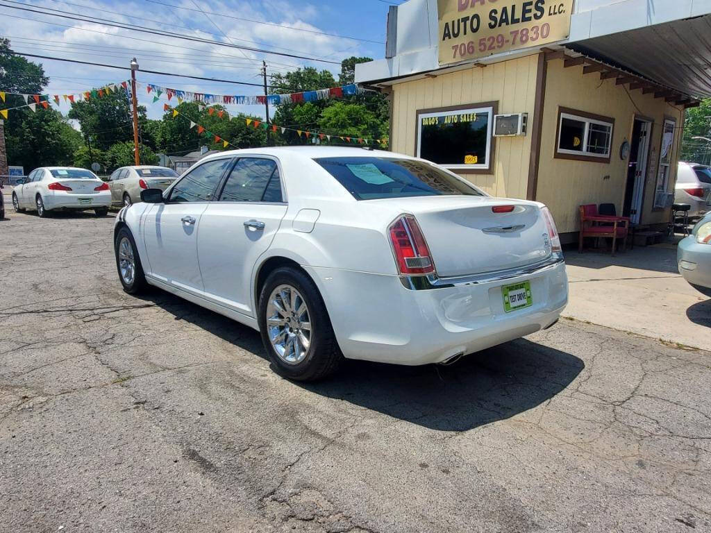 2014 Chrysler 300 for sale at DAGO'S AUTO SALES LLC in Dalton, GA