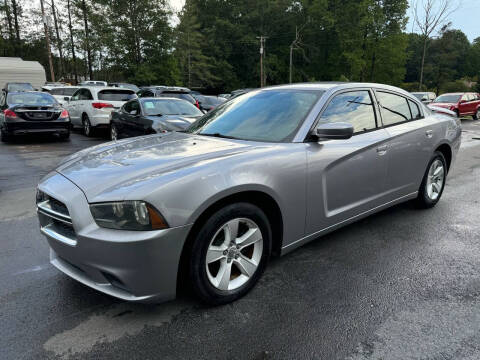 2014 Dodge Charger for sale at GEORGIA AUTO DEALER LLC in Buford GA