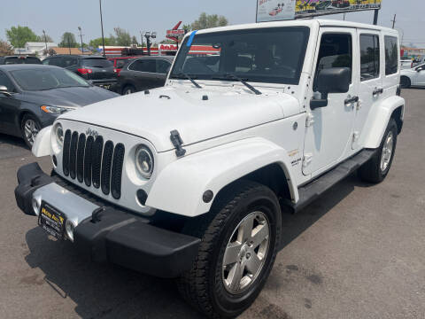 2012 Jeep Wrangler Unlimited for sale at Mister Auto in Lakewood CO
