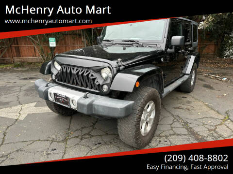 2014 Jeep Wrangler Unlimited for sale at McHenry Auto Mart in Modesto CA