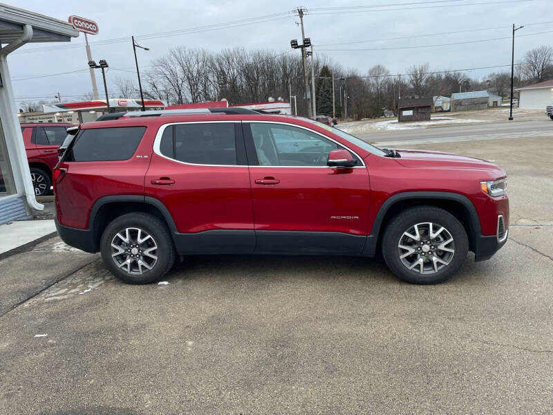 Used 2023 GMC Acadia SLE with VIN 1GKKNRL44PZ217042 for sale in Maquoketa, IA