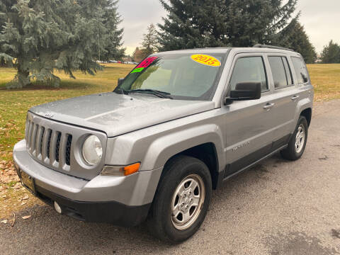 2015 Jeep Patriot for sale at BELOW BOOK AUTO SALES in Idaho Falls ID