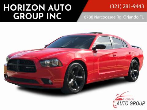 2014 Dodge Charger for sale at HORIZON AUTO GROUP INC in Orlando FL