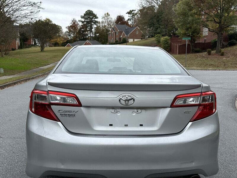 2012 Toyota Camry for sale at SHURE AUTO SALES in Snellville, GA