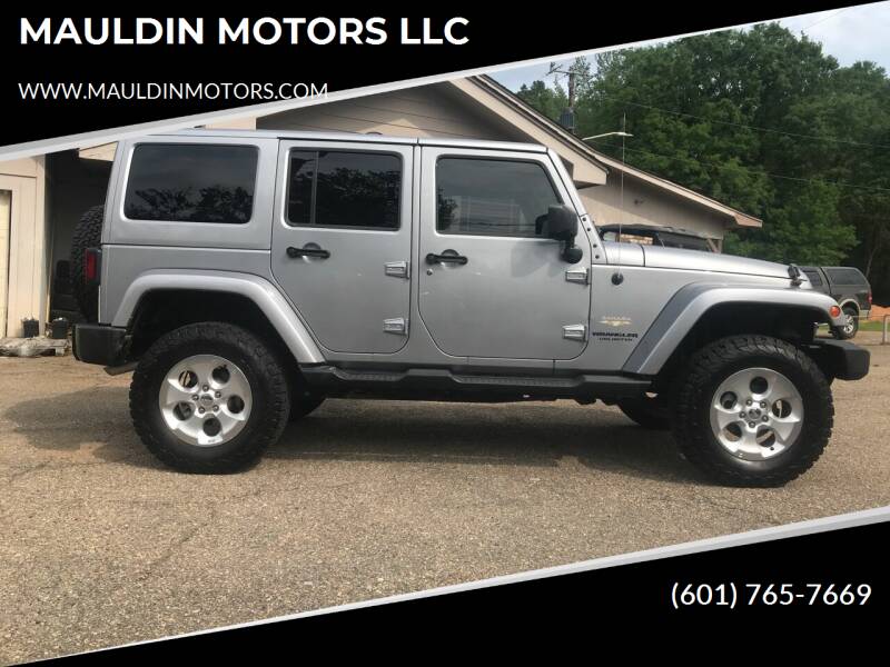 2015 Jeep Wrangler Unlimited for sale at MAULDIN MOTORS LLC in Sumrall MS