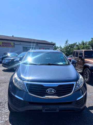 2012 Kia Sportage for sale at Rinaldi Auto Sales Inc in Taylor PA