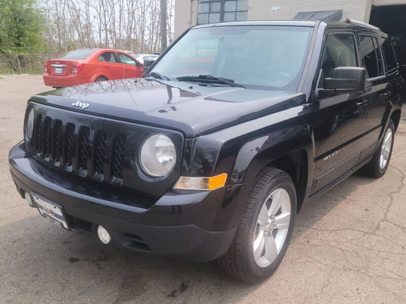 2012 Jeep Patriot for sale at Car Planet Inc. in Milwaukee WI