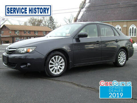 2011 Subaru Impreza for sale at SANTI QUALITY CARS in Agawam MA