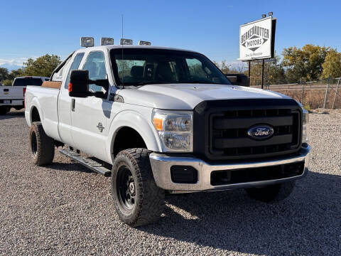 2014 Ford F-250 Super Duty for sale at BERKENKOTTER MOTORS in Brighton CO
