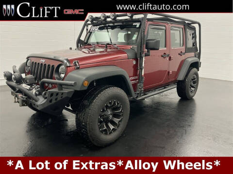 2013 Jeep Wrangler Unlimited for sale at Clift Buick GMC in Adrian MI
