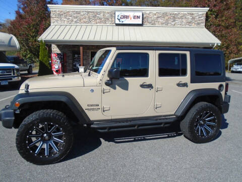 2016 Jeep Wrangler Unlimited for sale at Driven Pre-Owned in Lenoir NC