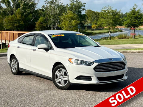 2014 Ford Fusion for sale at EASYCAR GROUP in Orlando FL