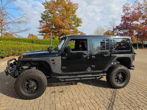 2015 Jeep Wrangler Unlimited for sale at GOLDEN RULE AUTO in Newark OH