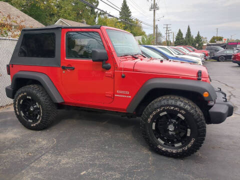 2012 Jeep Wrangler for sale at Jim Douglas Auto Sales in Pontiac MI