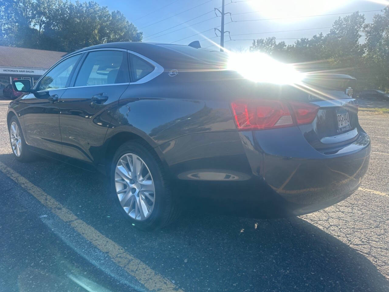 2014 Chevrolet Impala for sale at JUST AUTOS in MINNEAPOLIS, MN