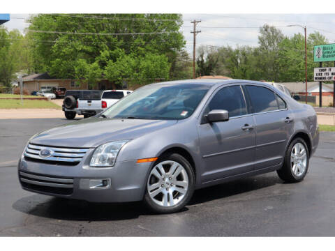 2006 Ford Fusion for sale at HOWERTON'S AUTO SALES in Stillwater OK