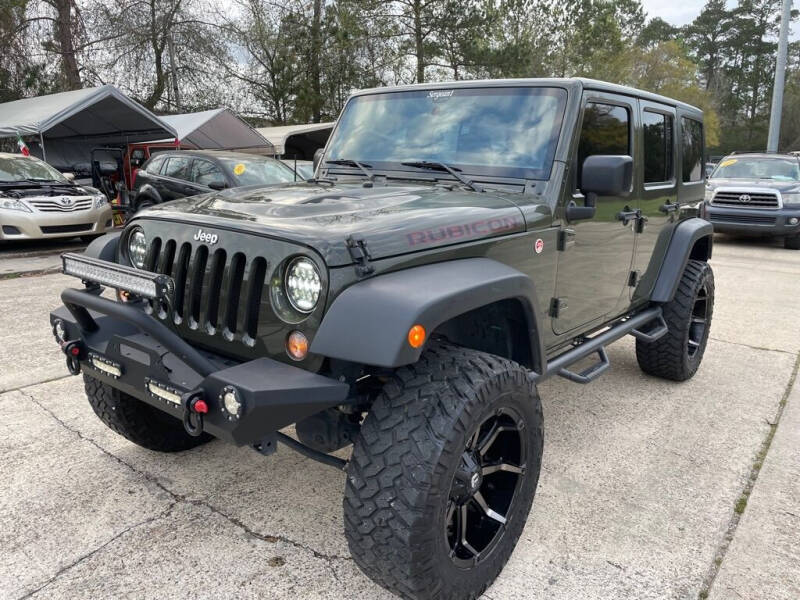 2016 Jeep Wrangler Unlimited for sale at AUTO WOODLANDS in Magnolia TX