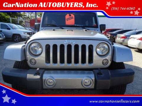2015 Jeep Wrangler Unlimited for sale at CarNation AUTOBUYERS Inc. in Rockville Centre NY