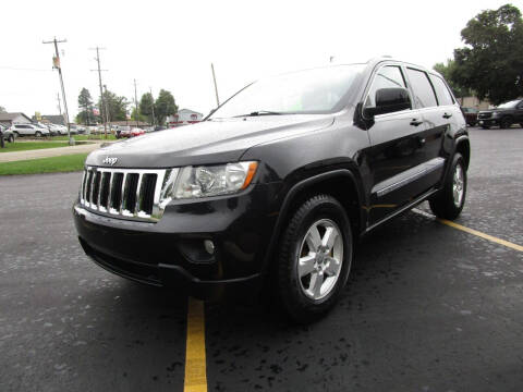 2011 Jeep Grand Cherokee for sale at Ideal Auto Sales, Inc. in Waukesha WI