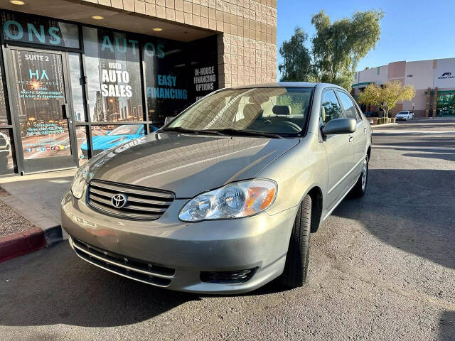 2003 Toyota Corolla for sale at HUDSONS AUTOS in Gilbert, AZ