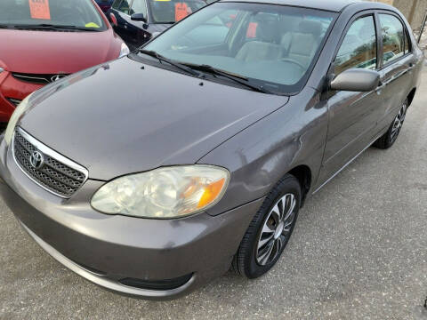 2005 Toyota Corolla for sale at Howe's Auto Sales in Lowell MA