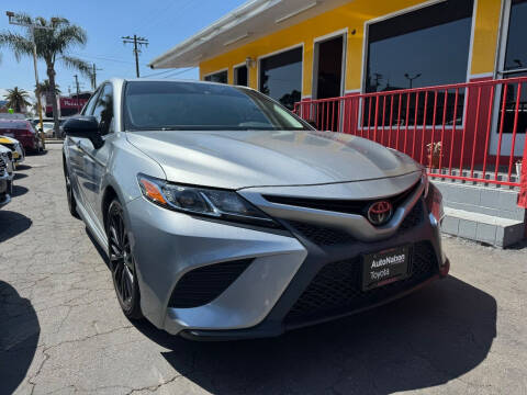 2019 Toyota Camry for sale at CROWN AUTO INC, in South Gate CA