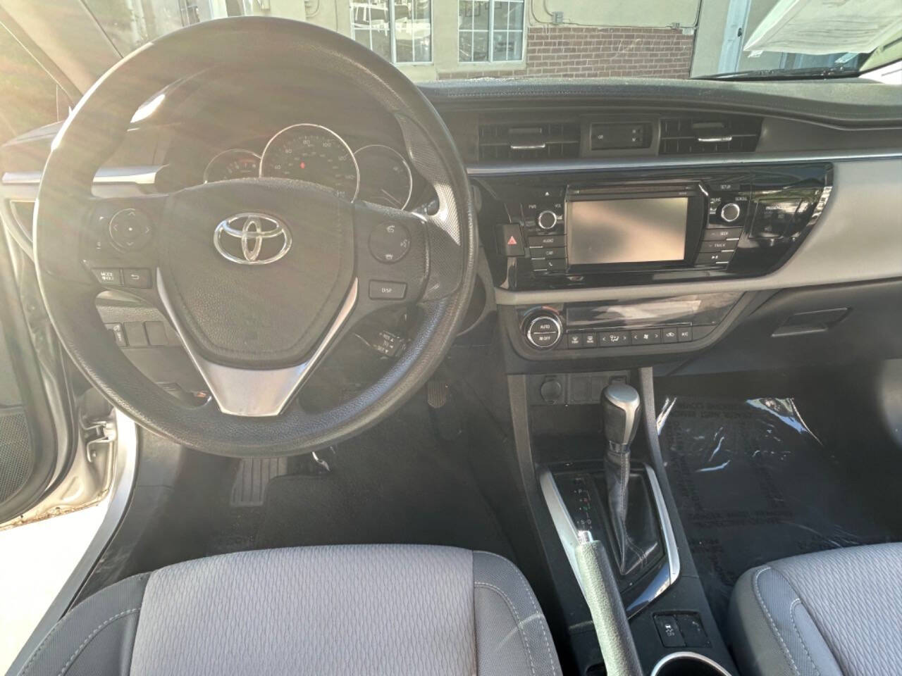 2015 Toyota Corolla for sale at Carmania in Panorama City, CA