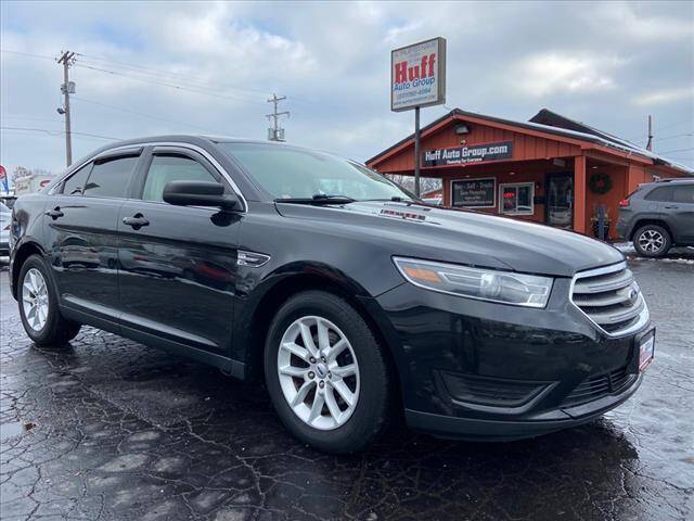 2015 Ford Taurus for sale at HUFF AUTO GROUP in Jackson MI