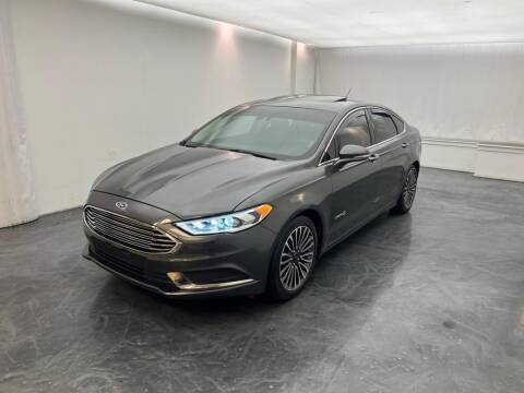 2018 Ford Fusion Hybrid for sale at Roman's Auto Sales in Warren MI