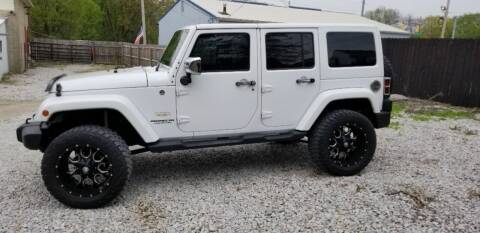 2013 Jeep Wrangler Unlimited for sale at DANVILLE AUTO SALES in Danville IN