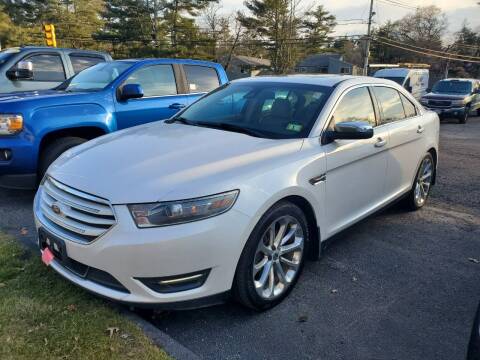 2014 Ford Taurus for sale at Topham Automotive Inc. in Middleboro MA