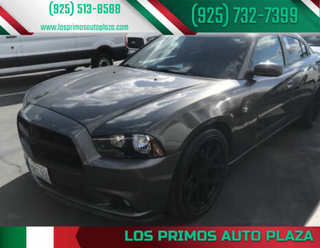 2014 Dodge Charger for sale at Los Primos Auto Plaza in Brentwood CA