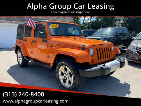 2013 Jeep Wrangler Unlimited for sale at Alpha Group Car Leasing in Redford MI