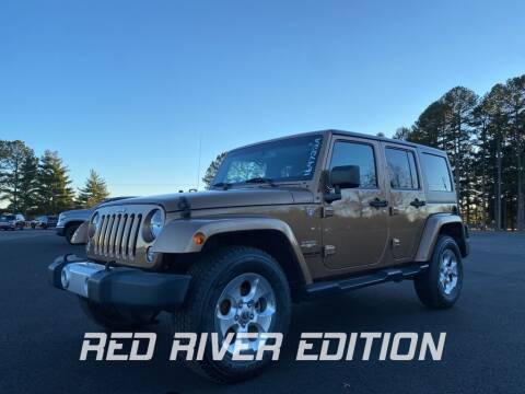 2015 Jeep Wrangler Unlimited for sale at RED RIVER DODGE - Red River of Malvern in Malvern AR