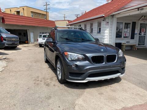 2015 BMW X1 for sale at STS Automotive in Denver CO