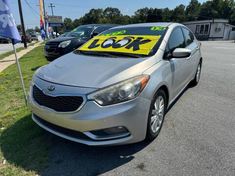 2014 Kia Forte for sale at Cars for Less in Phenix City AL