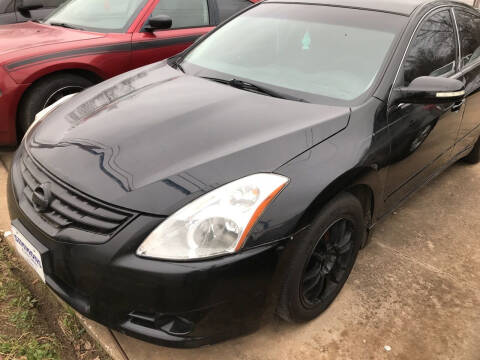 2011 Nissan Altima for sale at Simmons Auto Sales in Denison TX