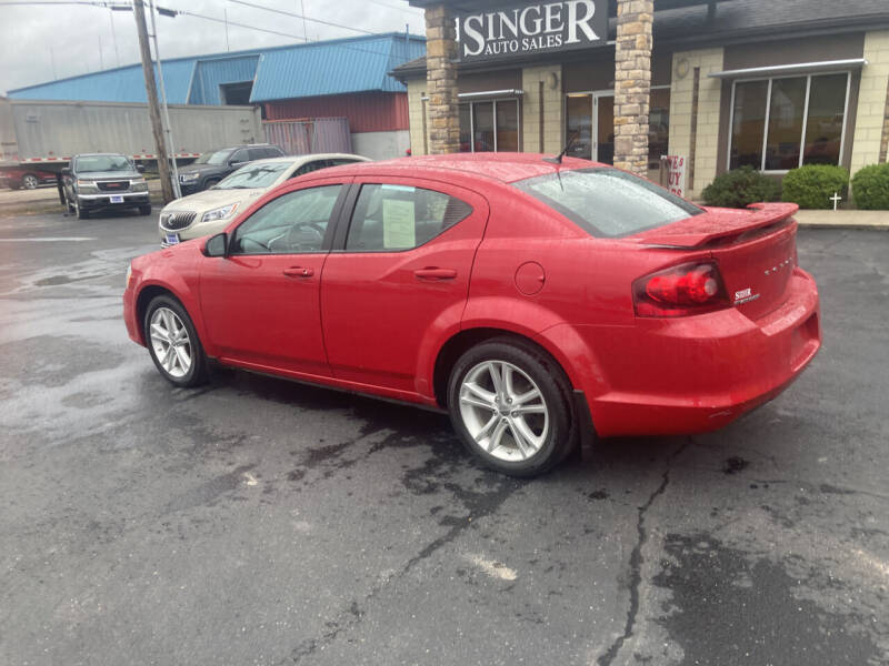 2013 Dodge Avenger for sale at Singer Auto Sales in Caldwell OH
