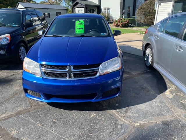 2013 Dodge Avenger for sale at Chuckie Bizzarro's Fleetwing Auto in Erie, PA