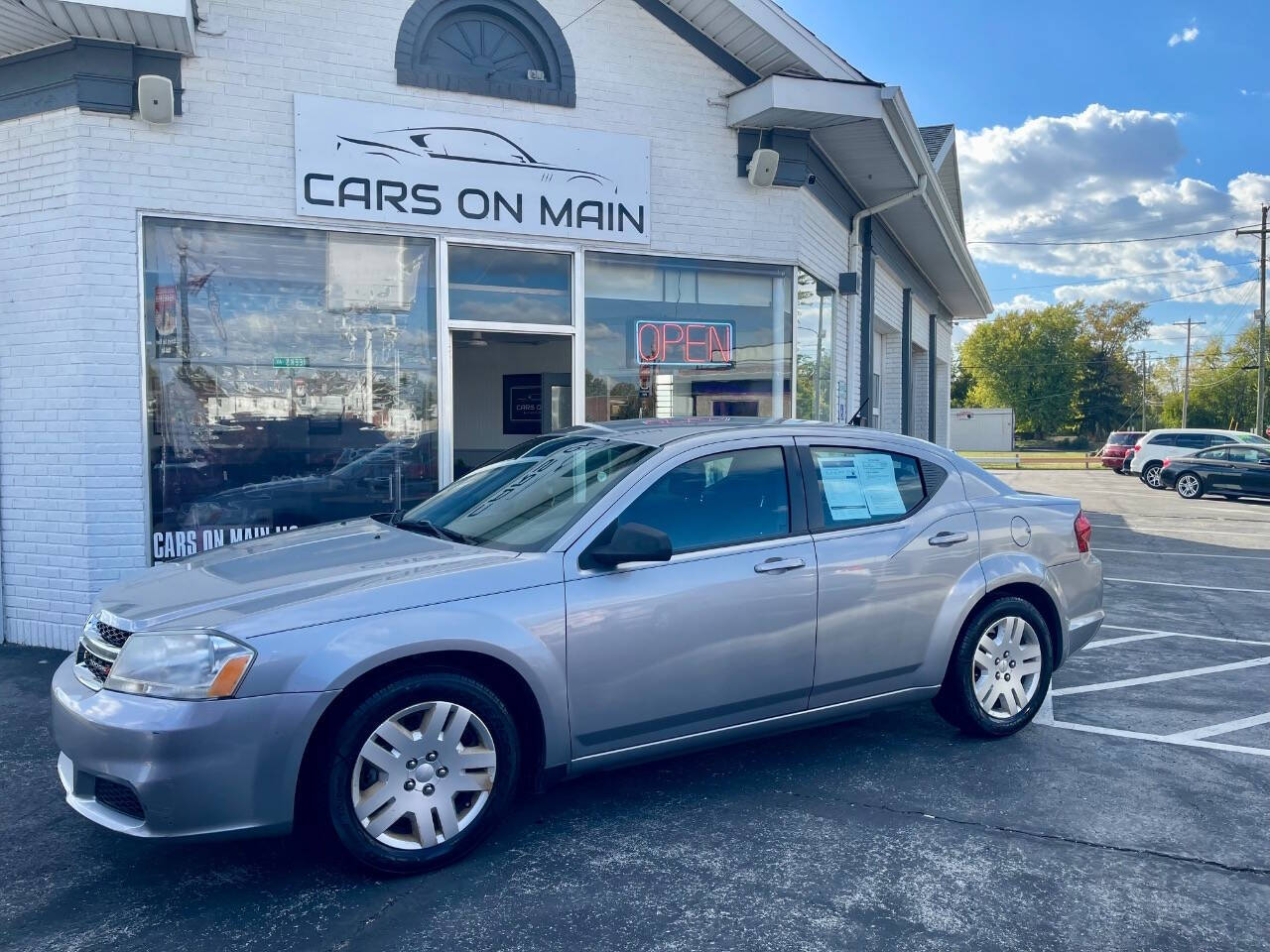 2014 Dodge Avenger for sale at Cars On Main in Findlay, OH