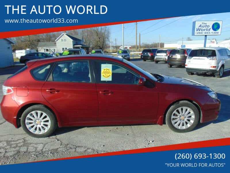 2011 Subaru Impreza for sale at THE AUTO WORLD in Churubusco IN