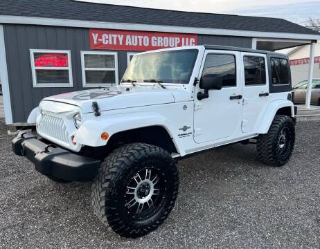 2013 Jeep Wrangler Unlimited for sale at Y-City Auto Group LLC in Zanesville OH