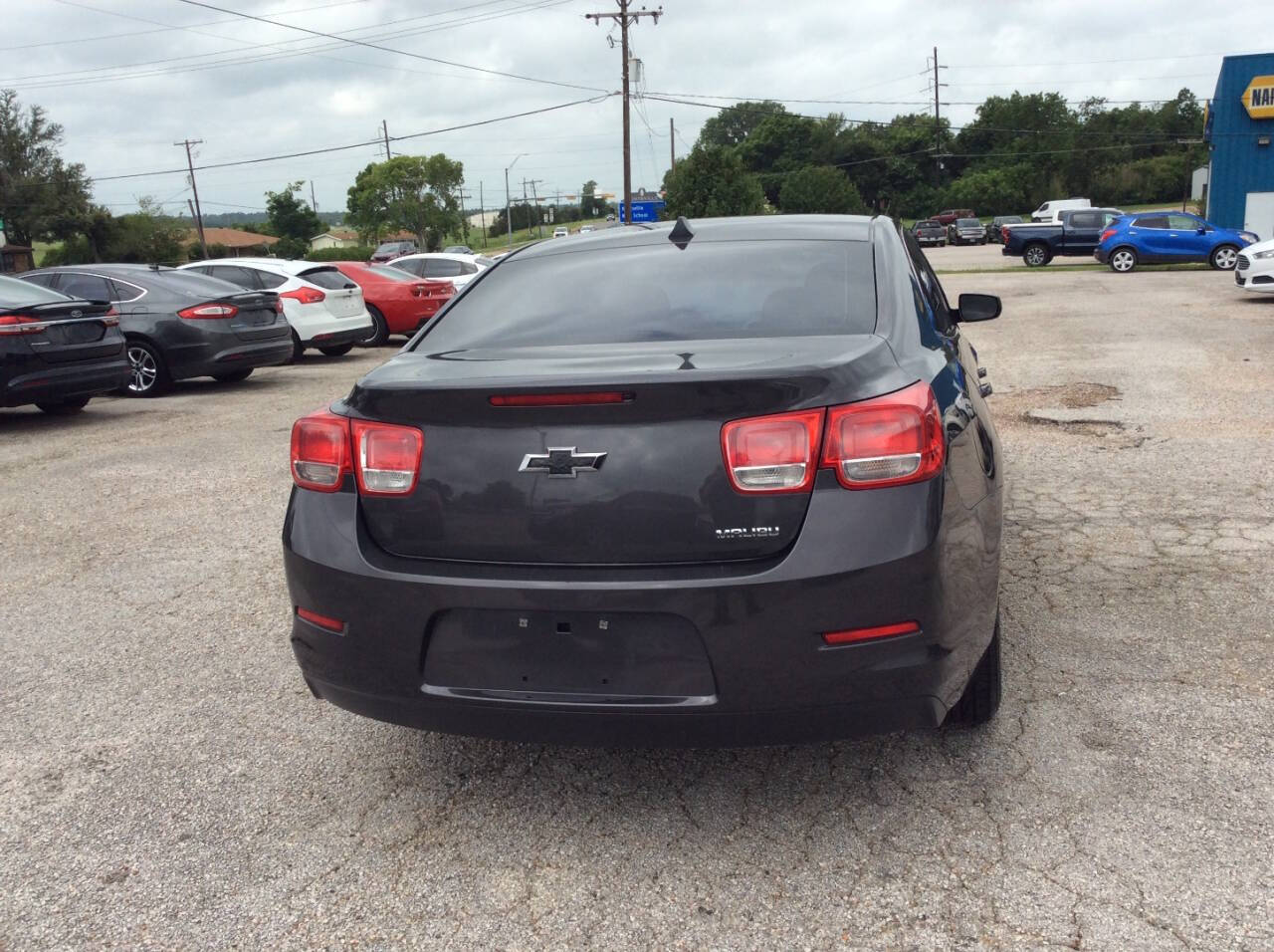 2013 Chevrolet Malibu for sale at SPRINGTIME MOTORS in Huntsville, TX