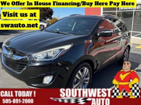 2014 Hyundai Tucson for sale at SOUTHWEST AUTO in Albuquerque NM