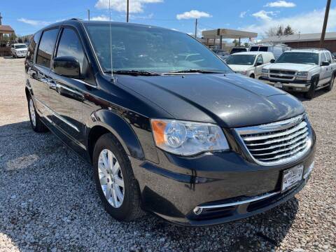 2015 Chrysler Town and Country for sale at BERKENKOTTER MOTORS in Brighton CO