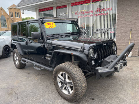 2014 Jeep Wrangler Unlimited for sale at KUHLMAN MOTORS in Maquoketa IA