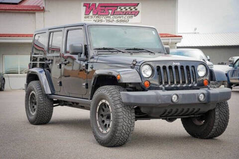 2012 Jeep Wrangler Unlimited for sale at West Motor Company in Hyde Park UT