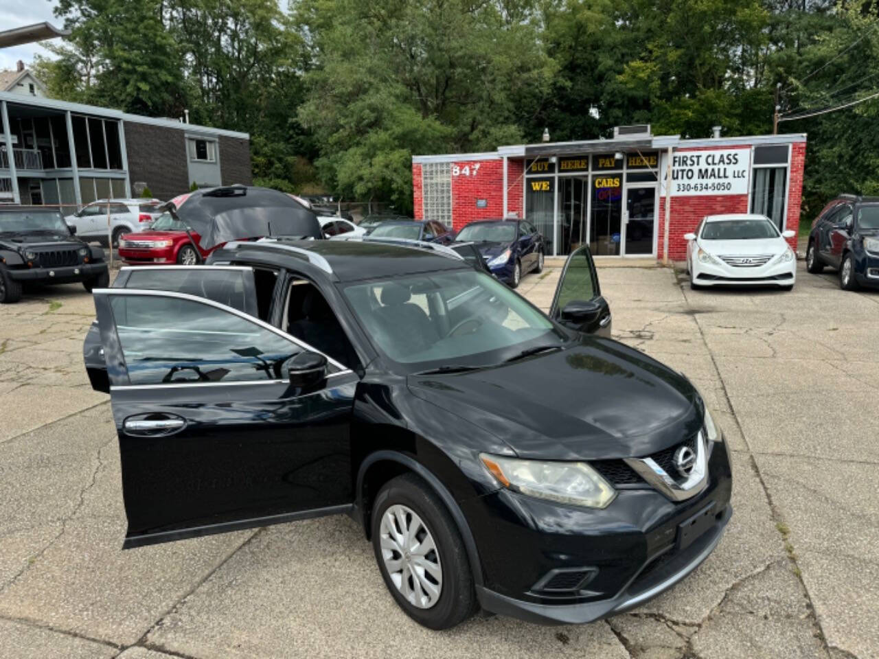 2015 Nissan Rogue for sale at First Class Auto Mall in Akron, OH