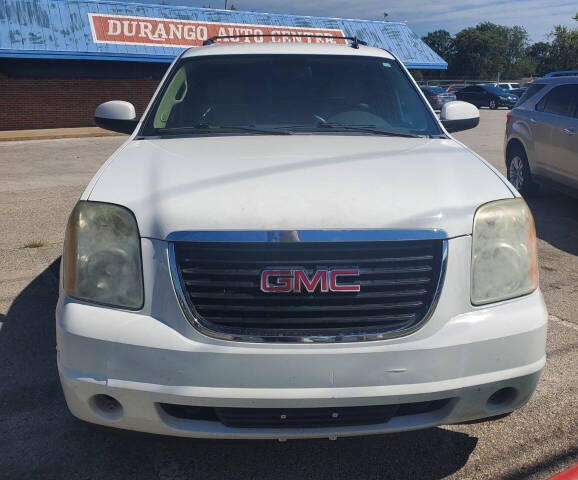 2013 GMC Yukon for sale at DURANGO AUTO CENTER LLC in Tulsa, OK